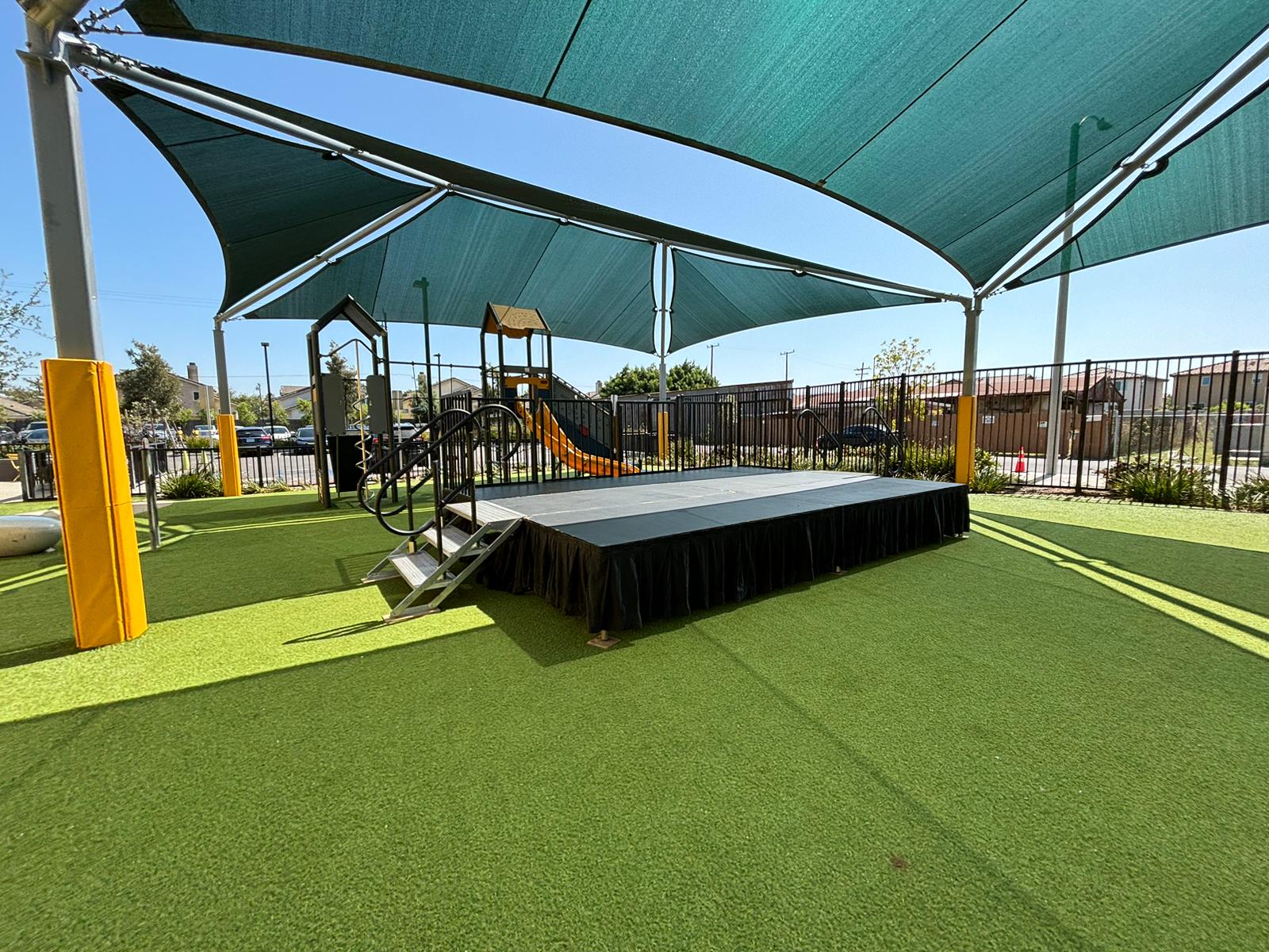 16' W x 12' D x 2' H Steeldeck portable stage rental with professional safety railing